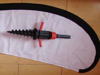 A plastic_screw is perfect for grass ground